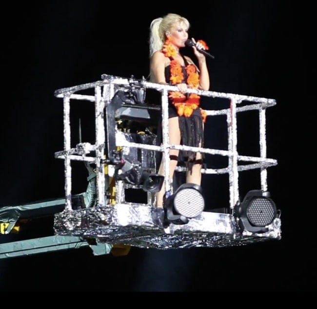 Ajda Pekkan as seen while singing on a crane machine during her concert at Kuruçeşme Arena, Istanbul in 2012