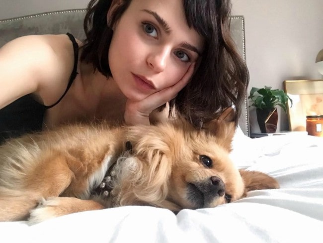 Alexandra Krosney in a selfie with her dog as seen in April 2019