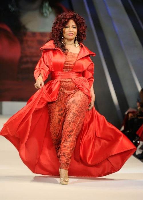 Chaka Khan walking on the runway wearing a Chris March design at The Heart Truth's Red Dress Collection 2012 Fashion Show at Hammerstein Ballroom on February 8, 2012 in New York City