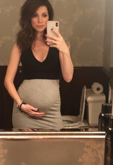 Courtney Henggeler as seen while showing her baby bump in a mirror selfie at Mayflower Inn in January 2019