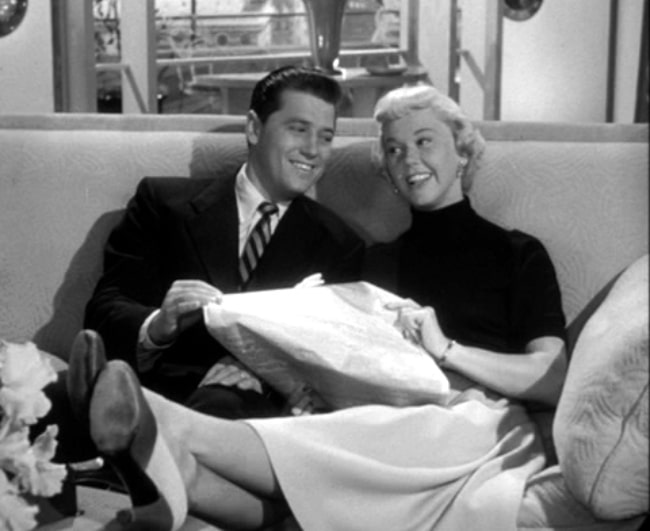 Doris Day as seen alongside Gordon MacRae in a still taken from the trailer of the film 'Starlift' (1951)