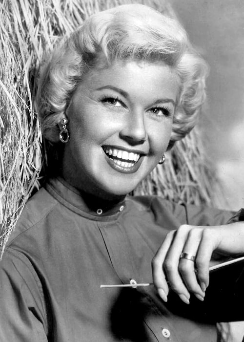 Doris Day smiling in a black-and-white picture taken in November 1957