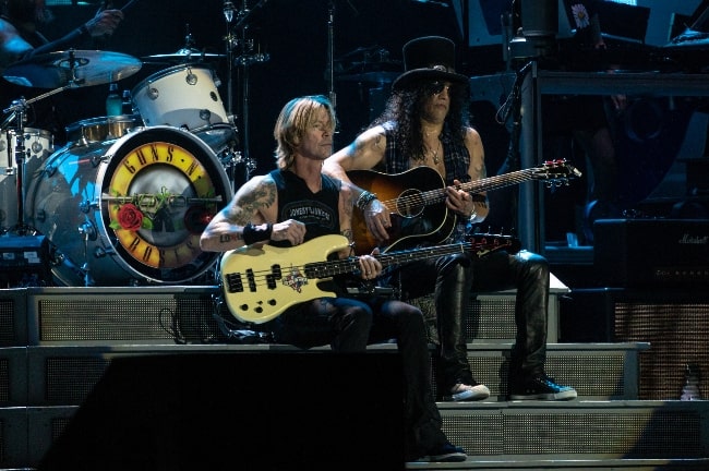 Duff McKagan (Left) and Slash performing in 2018