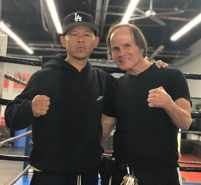 Ernie Reyes Jr. (Left) as seen while posing for a picture along with Benny The Jet Urquidez at Woodland Hills in Los Angeles, California, United States in May 2019