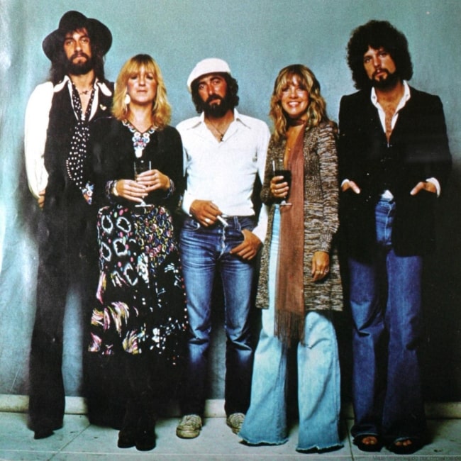 Fleetwood Mac members (From Left to Right) Mick Fleetwood, Christine McVie, John McVie, Stevie Nicks, and Lindsey Buckingham as seen in a picture taken for their album cover of Rumours