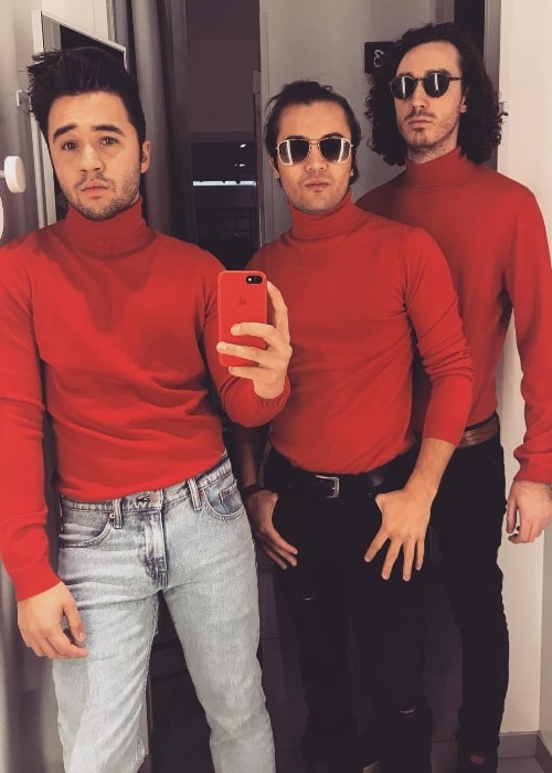 From Left to Right - Connor Montgomery, Taylor Gray, and Carneyval as seen in red turtlenecks while posing for a mirror selfie in December 2017