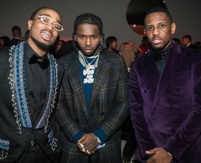 From Left to Right - Quavo Huncho, Pop Smoke, and Fabolous as seen while posing for a picture at Diddy's 50th birthday party in December 2019