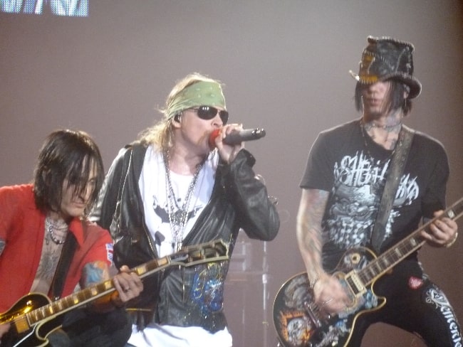 From Left to Right - Richard Fortus, Axl Rose, and DJ Ashba playing in Chile in 2011