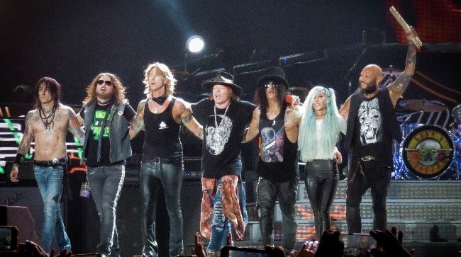 Guns N' Roses posing during an event