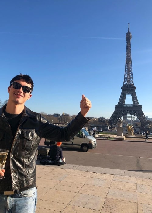 Jacob Bixenman as seen while posing for a picture with Eiffel Tower in the background in January 2020