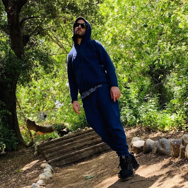 Jon B. posing for the camera in May 2019