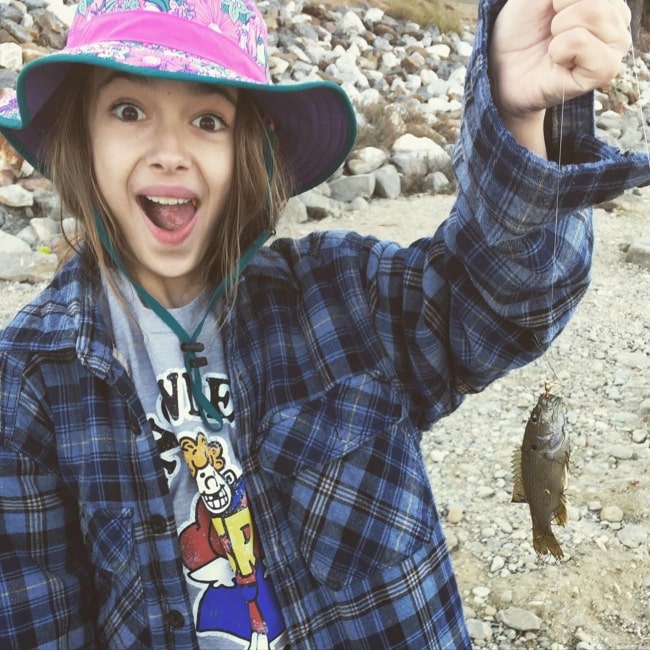 Julia Butters as seen in a picture taken after she got a fish while on a fishing trip with her father and grandfather in October 2019