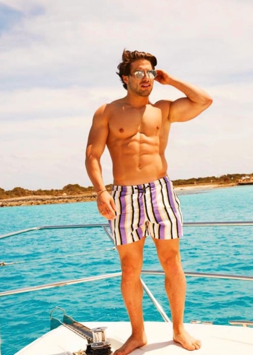 Kem Cetinay as seen in a shirtless picture taken on a boat in Ibiza May 2019