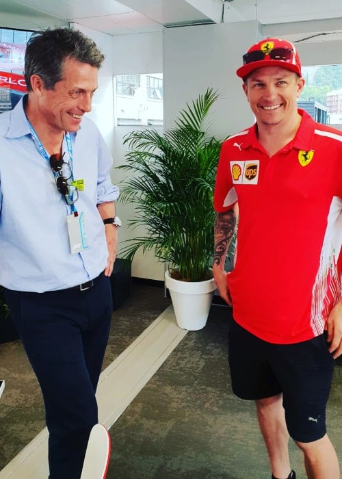 Kimi Räikkönen and British actor Hugh Grant on the sidelines of the Monaco GP in May 2018