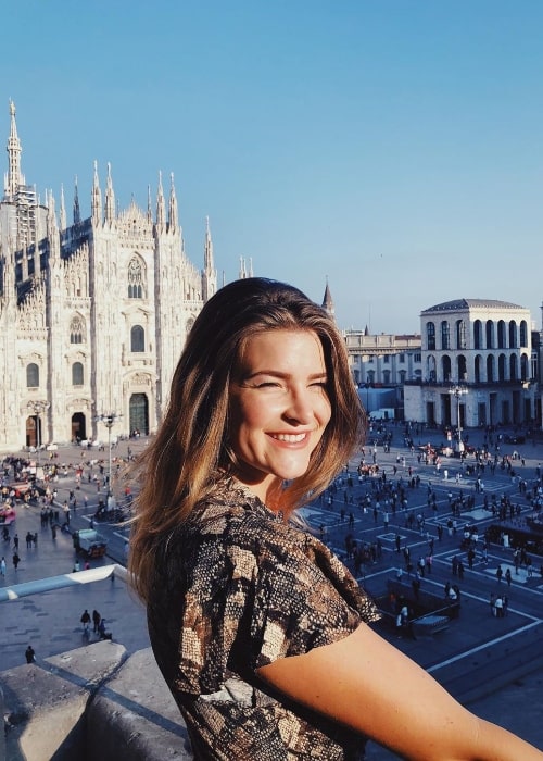 KittyPlays as seen while smiling for a picture with Milan Cathedral in the backdrop in September 2019 in Italy