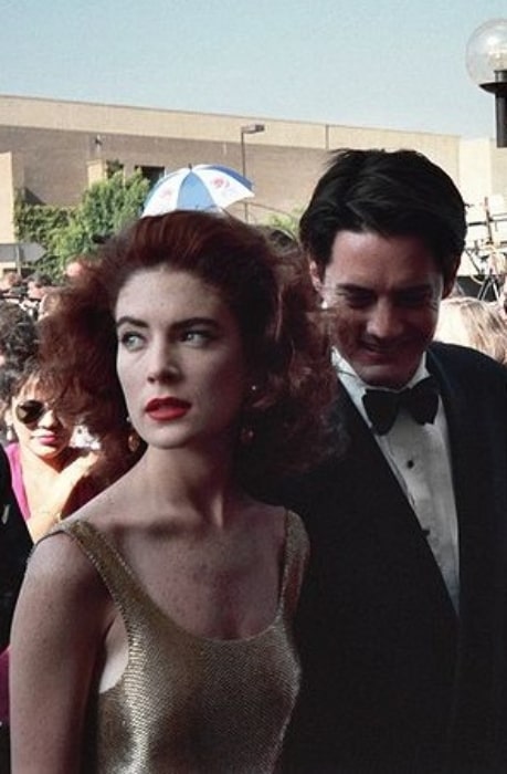 Lara Flynn Boyle and Kyle MacLachlan pictured while arriving at the 1991 Emmy Awards