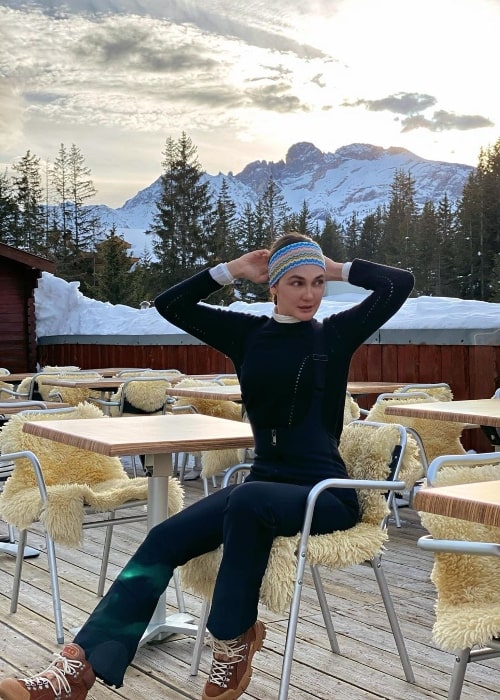 Luna Maya posing for the camera during a beautiful sunrise at Courchevel in Savoie, Rhone-Alpes, France in January 2020