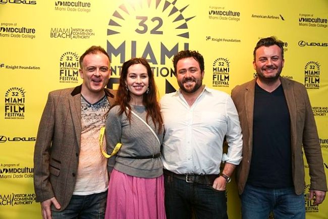 Maimie posing with director Andy Goddard (left), co-star Celyn Jones, and producer Andy Evans from her film Set Fire to the Stars