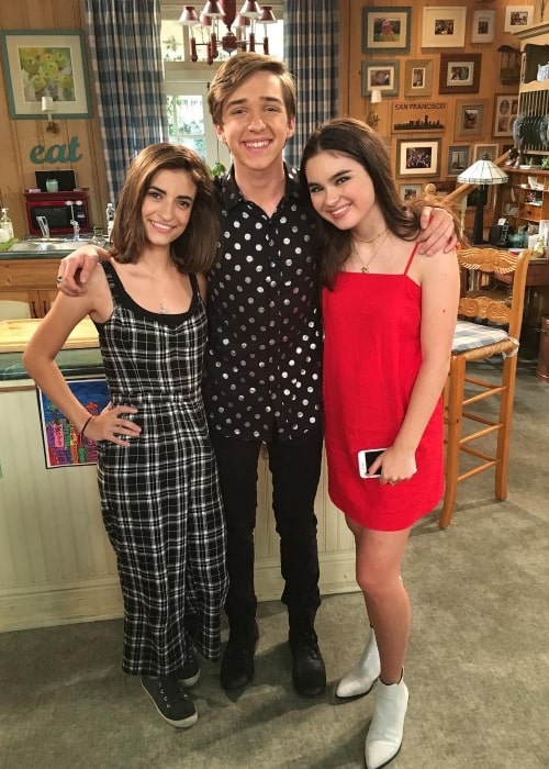 Michael Campion as seen in a picture taken on set of Fuller House with fellow co-stars Landry Bender and Soni Nicole Bringas in September 2018