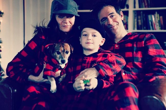 Michelle seen with husband Jack Davenport, son Harry, and their dog Frank in January 2019