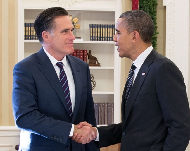 Mitt Romney (Left) as seen while shaking hands with President Barack Obama in the Oval Office following their lunch in November 2012