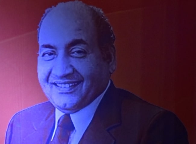 Mohammed Rafi as seen while smiling in a picture