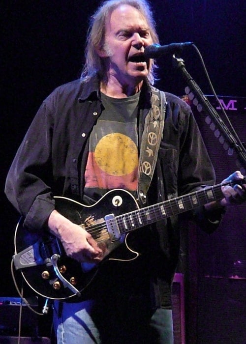 Neil Young as seen while performing at the Trent FM Arena in Nottingham in June 2009
