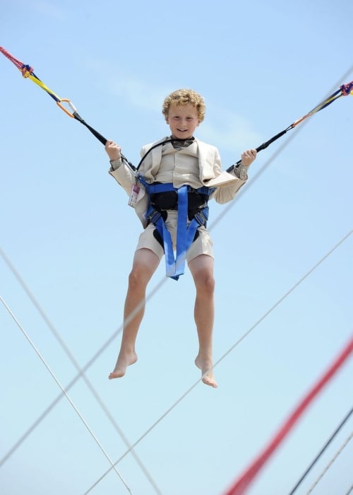 Parris Mosteller as seen in a picture taken while enjoying himself on a trampoline at an event for Judy Moody and the Not Bummer Summer in the past