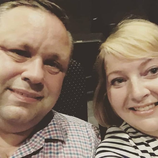 Paul Potts with his wife as seen in July 2019