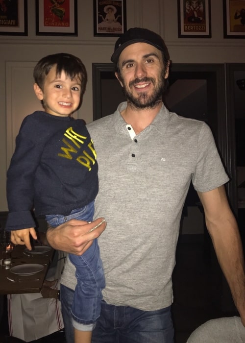 Ryan Miller as seen in a picture taken with his son Bodhi Ryan Miller in June 2018