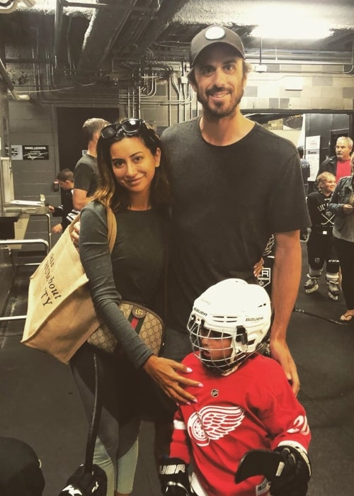 Ryan Miller as seen in a picture taken with his wife Noureen DeWulf at their son Bodhi Ryan's ice hockey match in July 2019