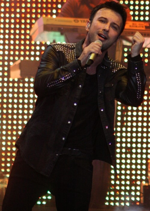 Tarkan as seen while performing during an event in April 2011