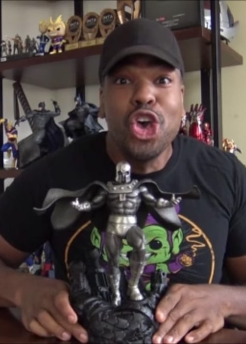 Tyrone Magnus while unboxing a Magneto Action Figure in October 2019