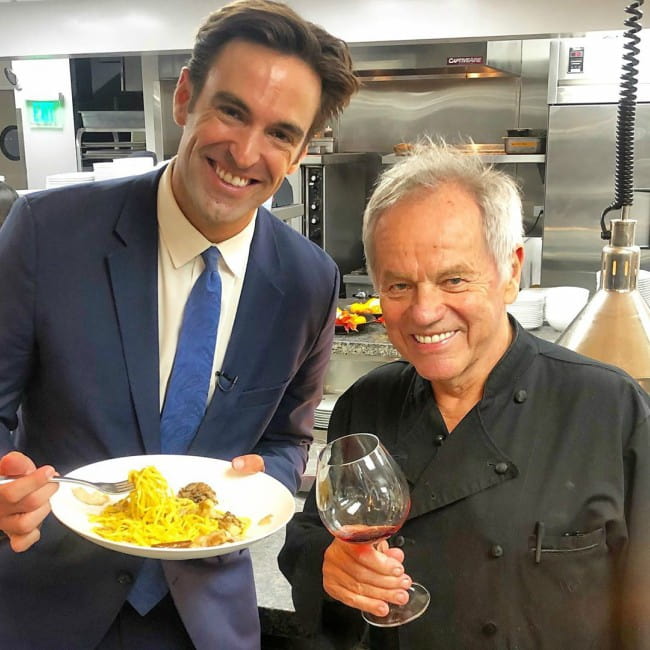 Wolfgang Puck (Right) and Elex Michaelson as seen in December 2019