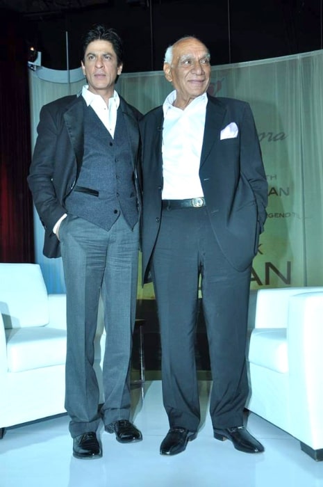 Yash Chopra (Right) as seen in a picture alongside Shahrukh Khan during his birthday party in October 2012