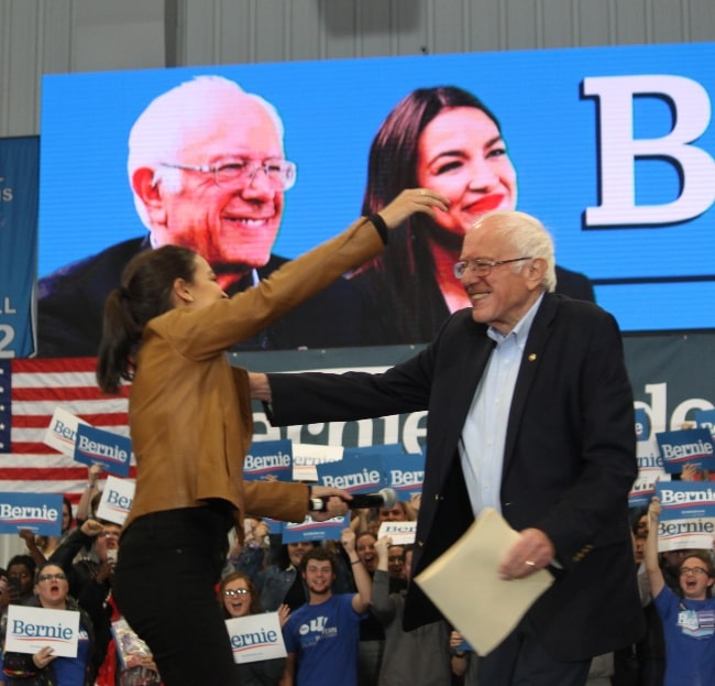 Alexandria Ocasio-Cortez and Sen. Bernie Sanders at a rally in Council Bluffs, Iowa in November 2019