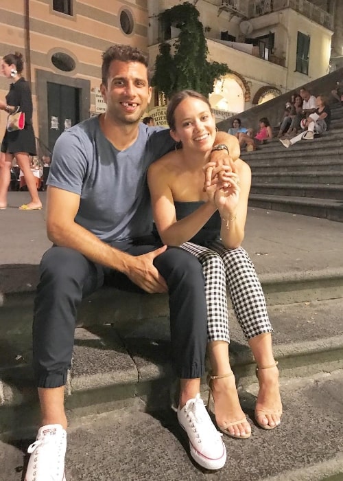 Allie Bertram as seen while posing for a picture alongside Andrew Cogliano at Duomo Di Amalfi located in the Piazza del Duomo, Amalfi, Italy in July 2017