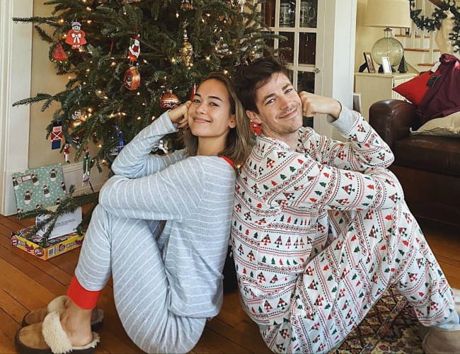 Andrea Thoma and Grant Gustin as seen in December 2019