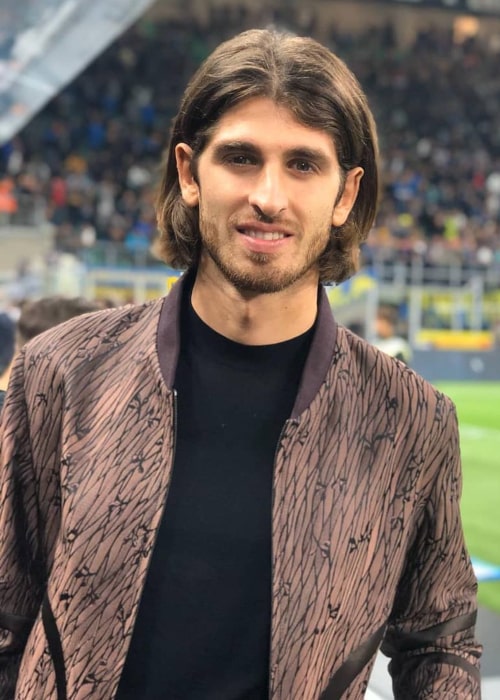 Antonio Giovinazzi attending a soccer match at Milan's San Siro stadium in October 2019