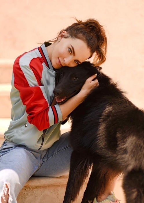 Belinda Peregrín as seen in a picture taken with her dog in May 2019