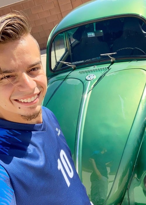 Branson Tannerites as seen in a selfie taken with his chilhood Volkswagon Beetle in October 2019