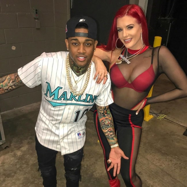 Conceited as seen in a picture taken with rapper, singer, and songwriter Justina Valentine at the BB&T Center in March 2020