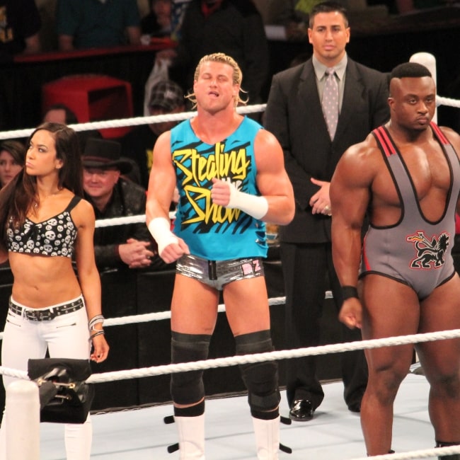 Dolph Ziggler, flanked by AJ Lee (left) & Big E Langston (right), preps for a match against Alberto Del Rio on WWE RAW on Februay 18, 2013