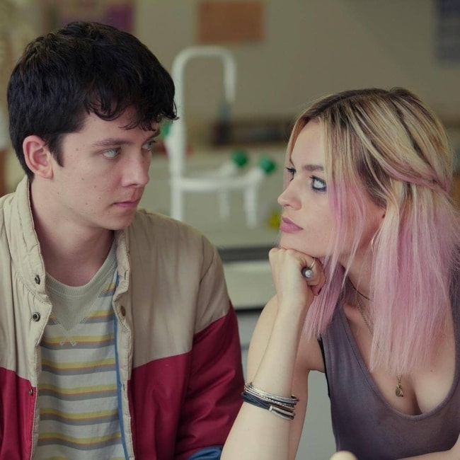 Emma Mackey as seen in a picture taken with her co-star Asa Butterfield while filming a scene for Netflix' show Sex Education in the past