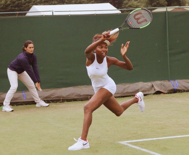 Françoise Abanda in action during a match at the 2017 Wimbledon Championships