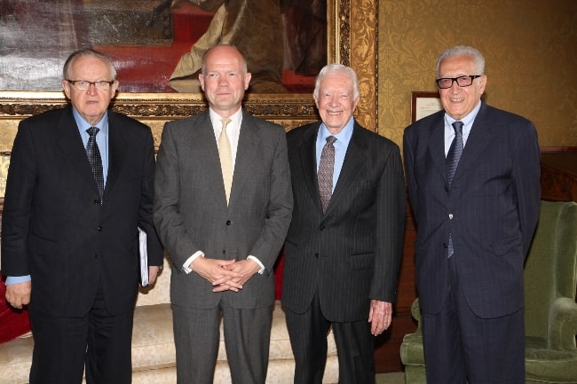 From Left to Right - Martti Ahtisaari, William Hague, Jimmy Carter, and Lakhdar Brahimi as seen while meeting in London, England in July 2013