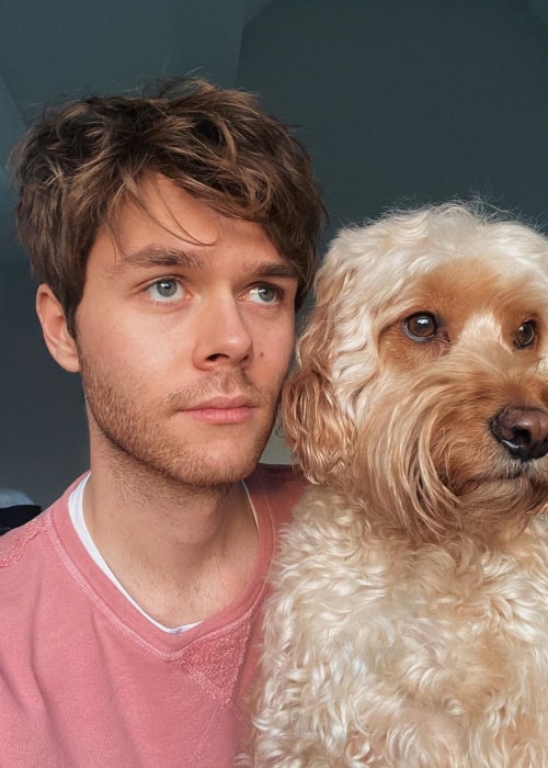 Harrison Webb with his pet dog, as seen in January 2020