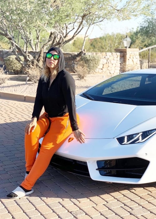 Jeddah Navalua as seen in picture taken while sitting on the hood of her Lamborghini in Scottsdale, Arizona in October 2018