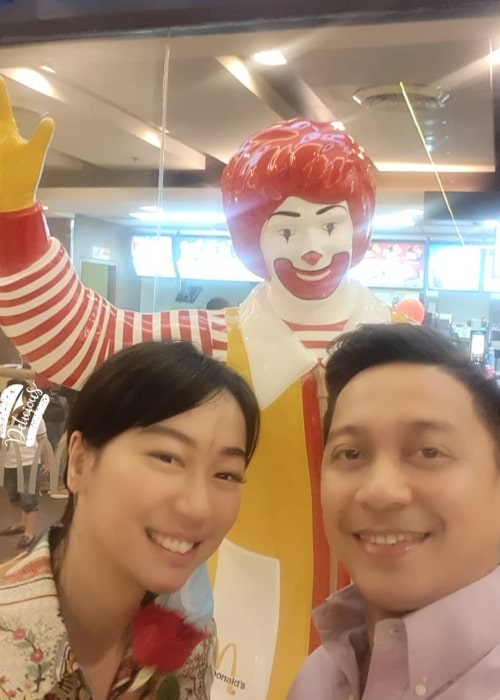 Jhong Hilario as seen in a selfie taken with his girlfriend Maia Leviste Azores on the day of Valentines in front a McDonald's statue in February 2020