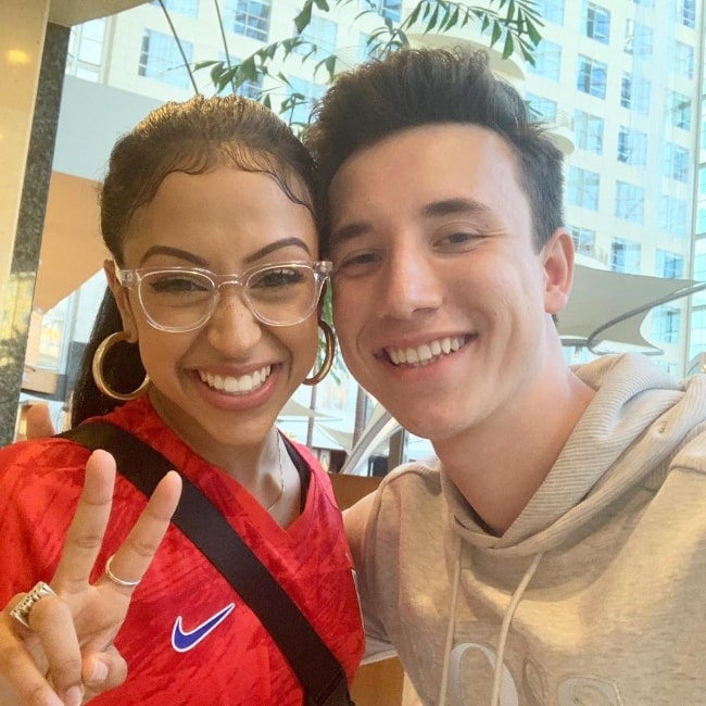 Josh Sadowski as seen while smiling in a picture alongside Liza Koshy in Anaheim, Orange County, California in July 2019